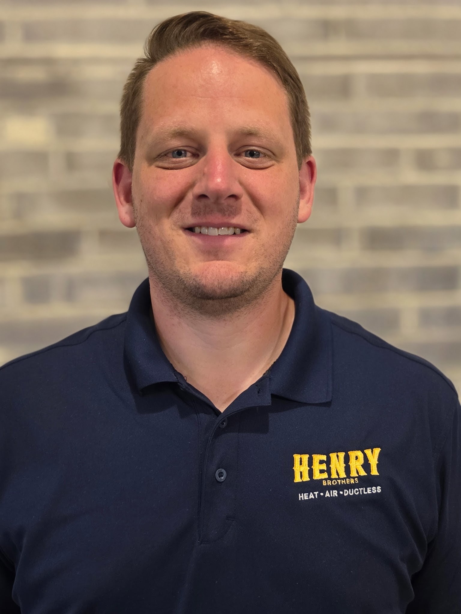 Justin Henry, co-founder of Henry Brothers Heat • Cool • Mini Splits
